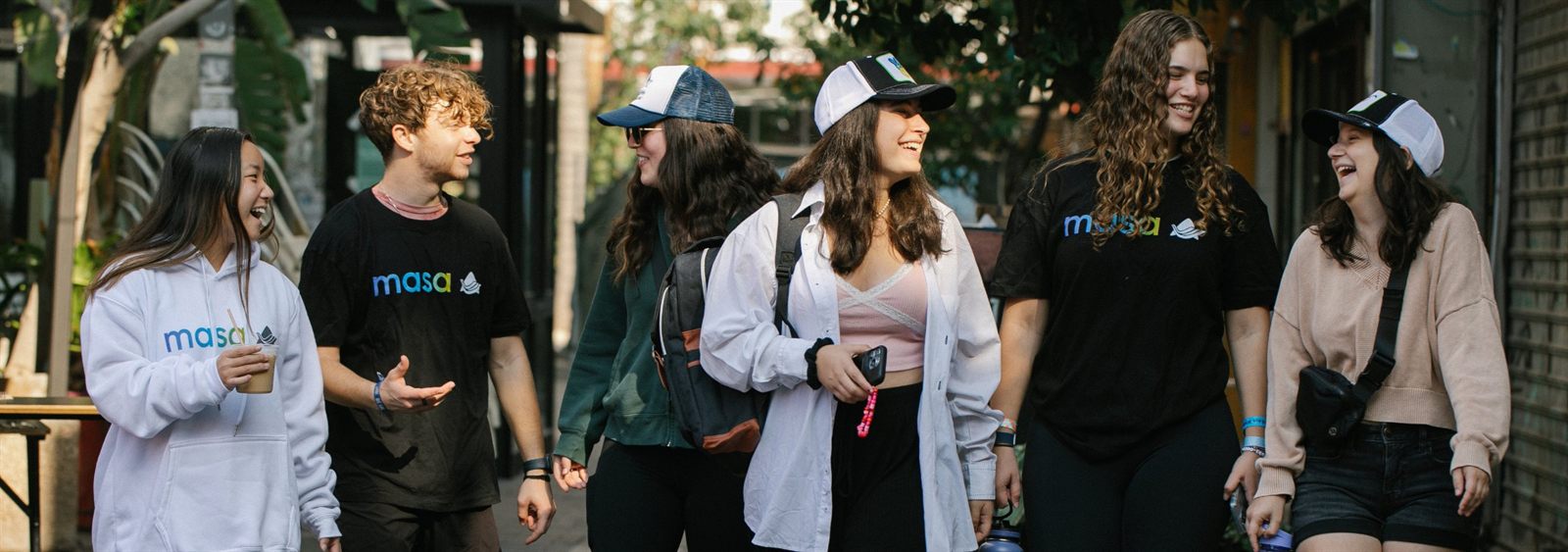 Young adults in Masa gear walking together in Israel